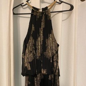 Maxi dress in metallic-foil print pleated design w/ gold hardware. Size - 6